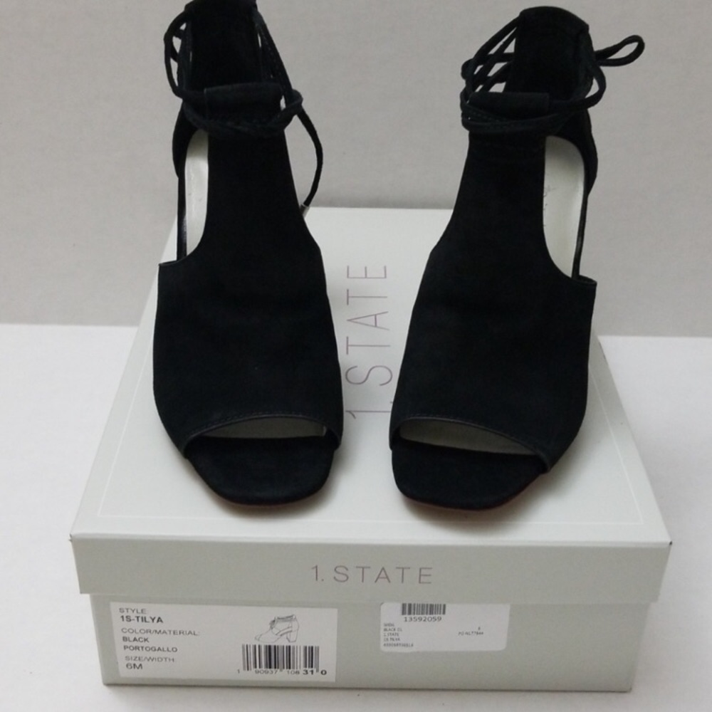 1. State black suede heels with tie closure. Sz 6